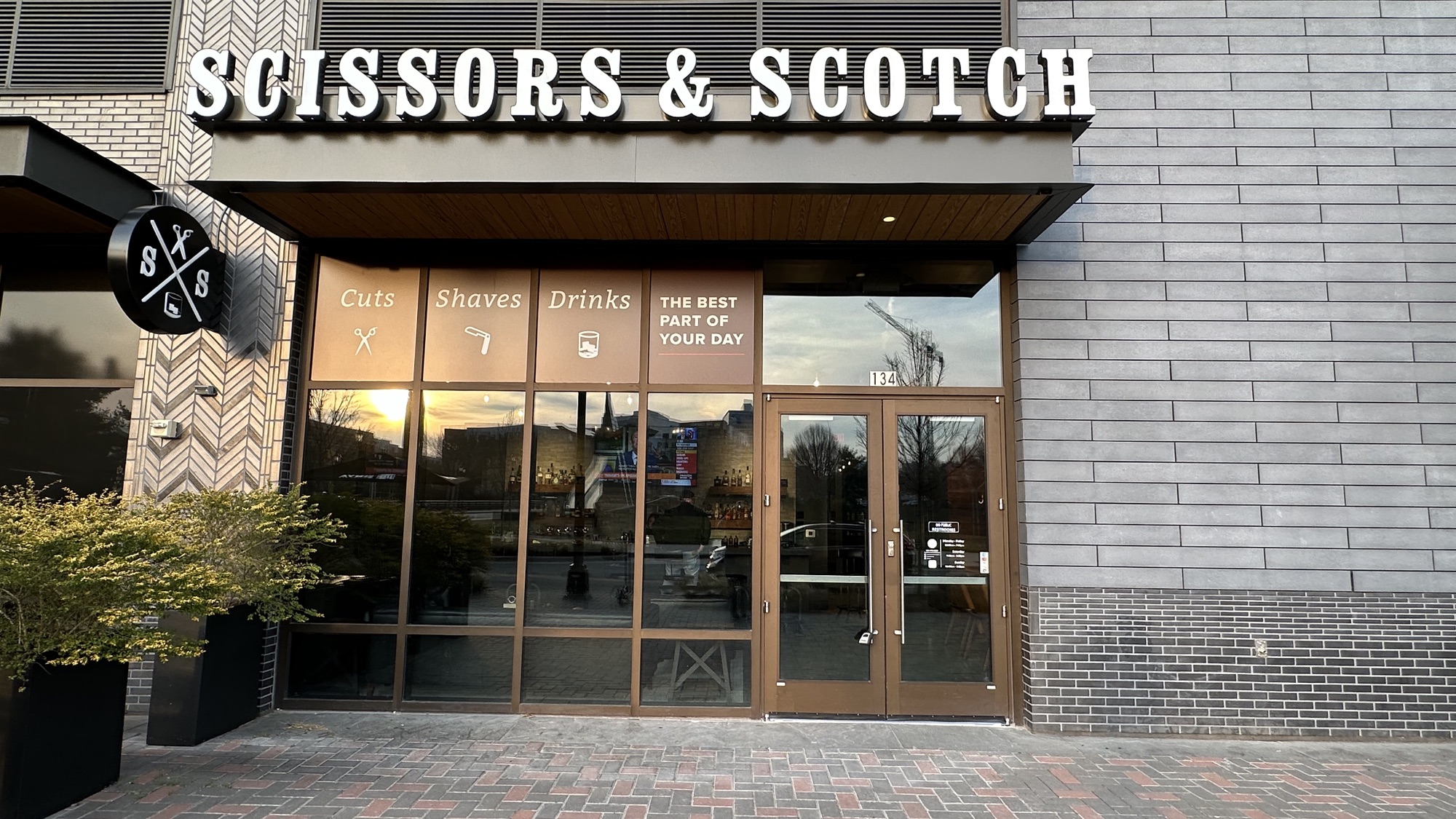 Scissors & Scotch storefront at 601 S Tryon St, Uptown Charlotte