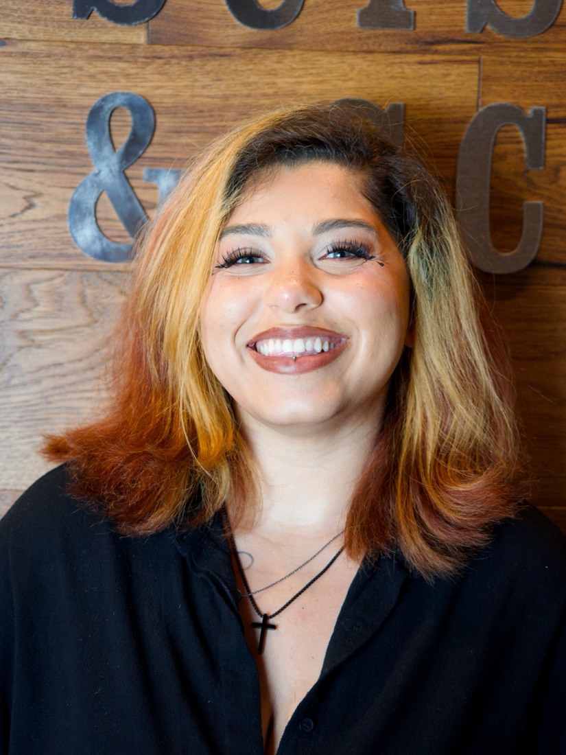 Deja, stylist at Scissors & Scotch Uptown Charlotte