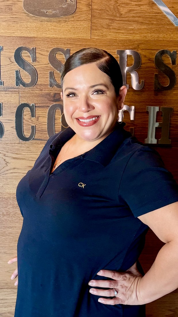 Raina, stylist at Scissors & Scotch Uptown Charlotte