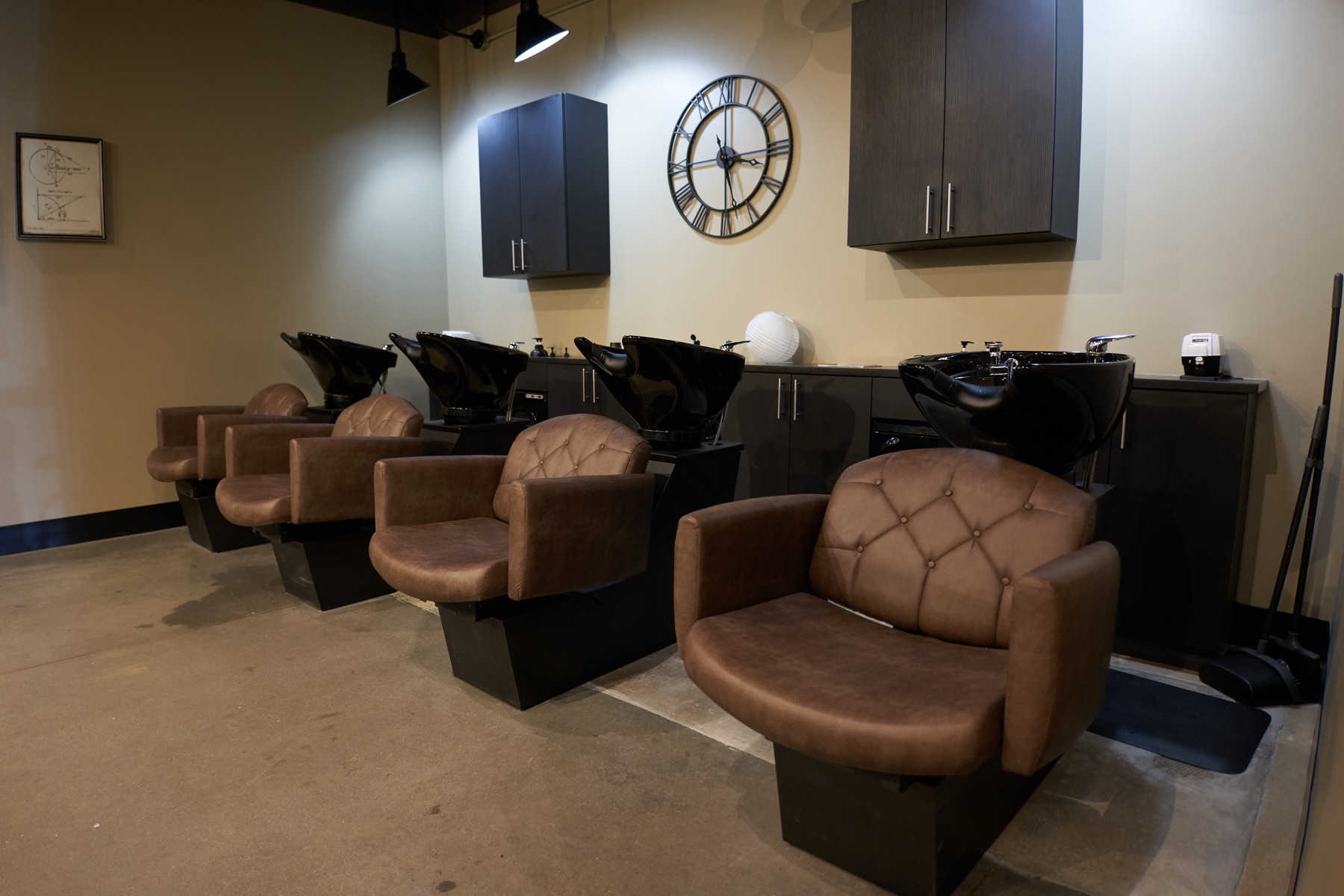 The reclining wash stations at Scissors & Scotch Uptown Charlotte